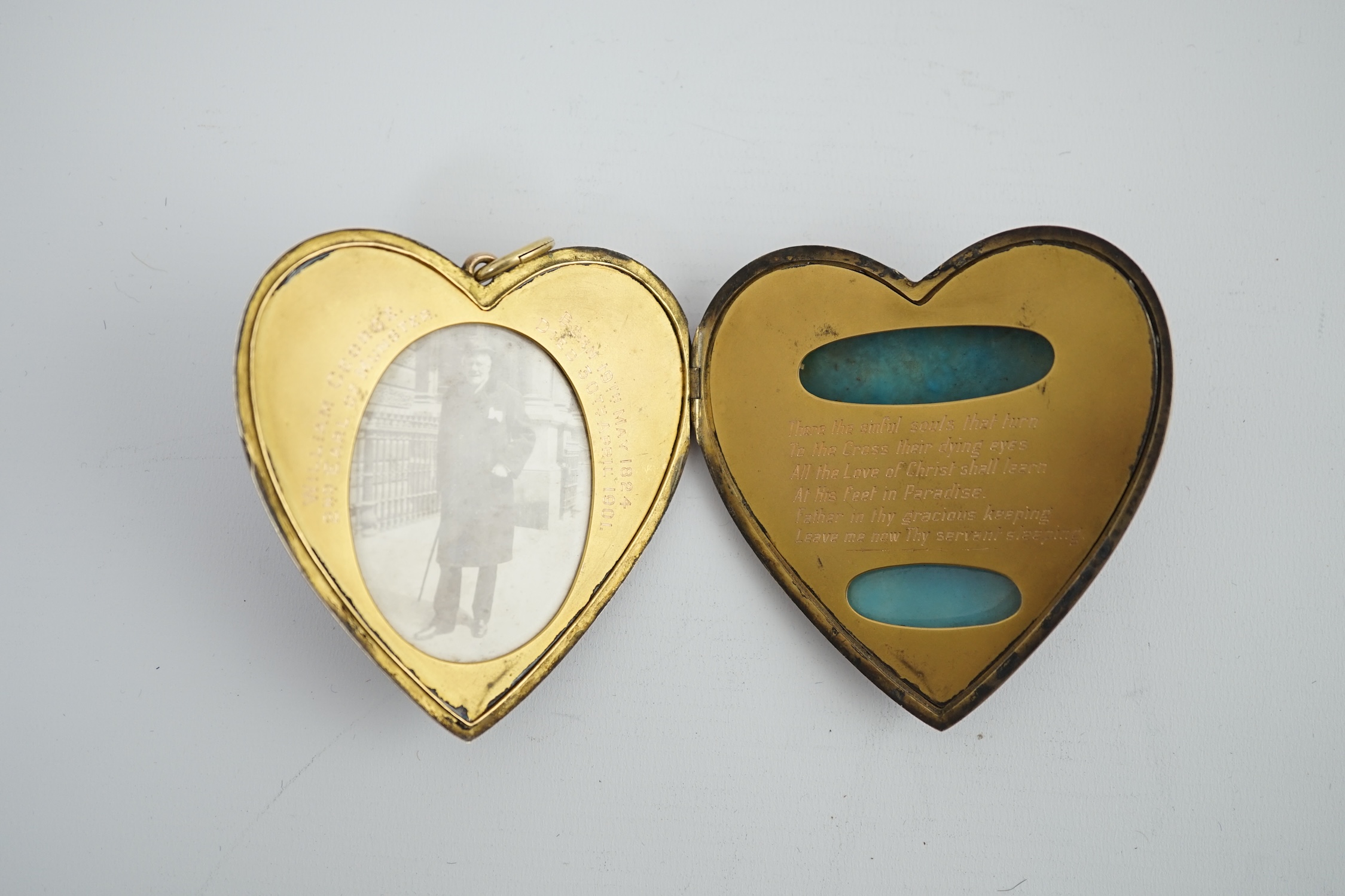 An Edwardian silver gilt? and guilloche enamel large heart shaped memorial locket